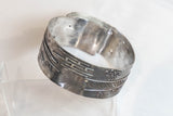 Silver cuffs with 18ct gold detail