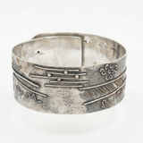 Silver cuffs with 18ct gold detail